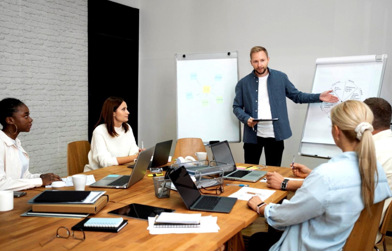 Small group financial education workshop with hands-on activities